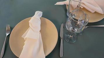 Festive table setting in the restaurant. Wedding preparations. Selective focus. photo