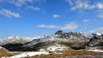Time-Lapse on the peaks with first snowfalls of early autumn
