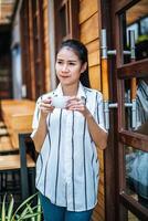 Portrait of beautiful asian woman relax at cafe photo