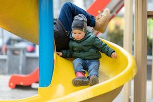 Beautiful baby boy with child face posing photographer photo