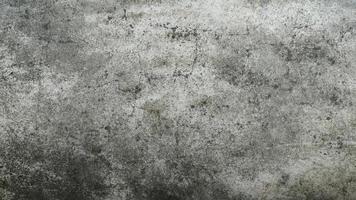Grunge concrete cement wall with crack photo
