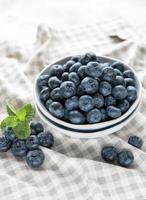 Blueberries on textile background photo