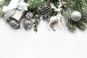 Festive white background with Christmas decorations photo