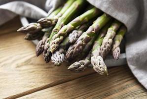 Asparagus  on old wooden  background. photo