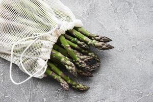 Asparagus stems in an eco mesh bag