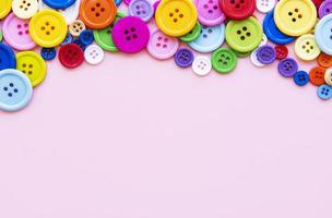 Multicolored sewing buttons photo