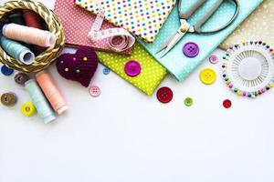 Sewing accessories on a white background photo