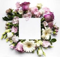 Pink flowers in  frame with white square for text photo