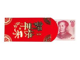 Chinese or 100 Yuan banknotes money in red envelope isolated on white background, Chinese text on envelope meaning Happy Chinese New Year, Clipping path photo