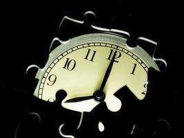 Missing jigsaw puzzle pieces on Alarm clock background, Business solution concept, Time for success concept photo