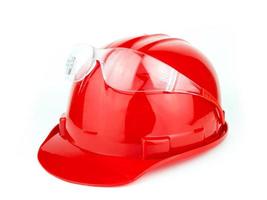 Construcción de casco y gafas de seguridad aislado sobre un fondo blanco. foto