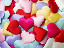 Colorful mini hearts background, Valentine decorations, Various hearts photo