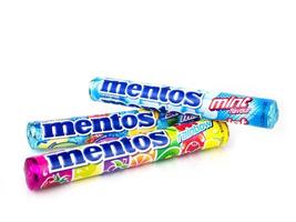 BANGKOK THAILAND - January 30, 2019, Mentos chewy dragees that provides the benefit of minty freshness with an enjoyable chew isolated on white background. photo