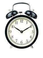 Alarm Clock on white, showing ten o'clock on white background photo