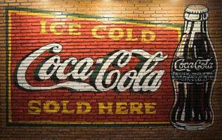 BANGKOK -THAILAND, Nov 12,2017 Old condition vintage wall of Coca-Cola logo at museum Ban Bang Khen in Bangkok Thailand photo