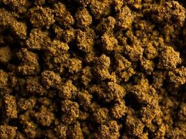 Granules of instant coffee background photo