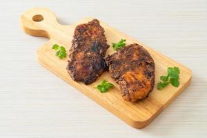 spicy grilled jamaican jerk chicken photo