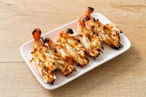 grilled river prawns or shrimps with cheese photo