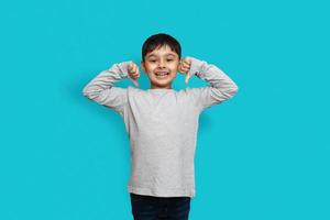 Shirt design and people concept - close up of little boy in plain tshirt front and rear isolated. Mock up template for design print photo