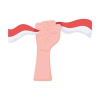 mano sostiene la bandera de Indonesia vector