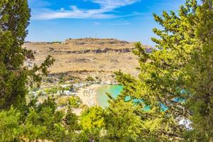 Lindos Beach bay panorama with turquoise clear water Rhodes Greece photo