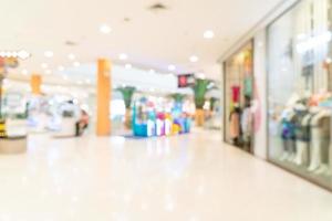 Abstract blur shop and retail store in shopping mall for background photo