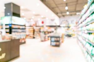 Abstract blur and defocused supermarket for background photo