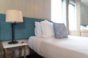 Resumen borroso hermoso dormitorio de hotel de lujo foto
