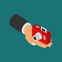 Camera in hand isometric vector