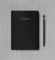 Note book and pencil on grunge concrete texture background. Vector. vector