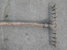 Garden tools for repair shovel, rake, hammer photo