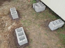 Concreting foundation blocks, cinder, concrete work photo