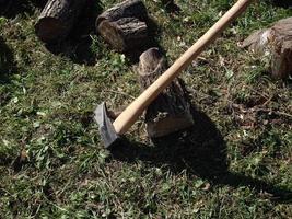 Chopping wood from palen for the winter for the stove photo