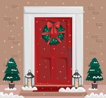 Christmas red door with wreath and snow