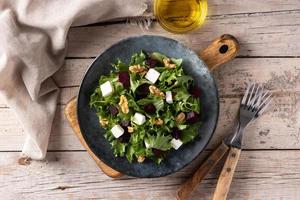 Beetroot salad with feta cheese,lettuce and walnuts photo