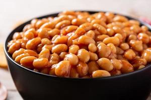 White beans in tomato sauce in bowl photo