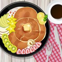 Pancake with kiwi and strawberry toppings in a plate on table background vector