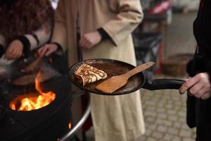 street cooking of pancakes photo