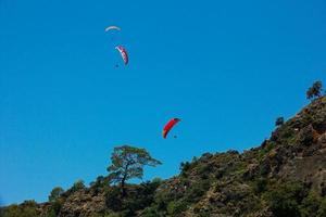 Paragliding in sunny weather