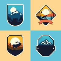 cuatro emblemas de aventura vector