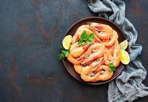 Shrimps served on a plate photo