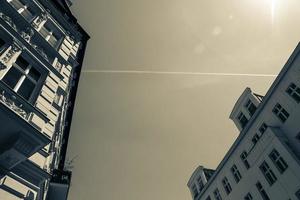 Old european apartment building view from below photo