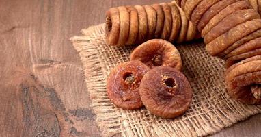 Fresh Figs or Anjeer fruit healthy vegan food concept organic dry fruits on wooden background photo