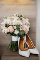 elegant wedding bouquet of fresh natural flowers photo