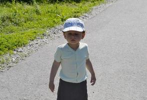 Beautiful baby boy with child face posing photographer photo