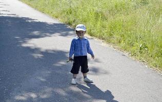 Beautiful baby boy with child face posing photographer photo