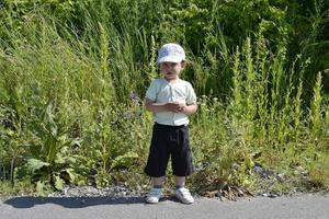 Beautiful baby boy with child face posing photographer photo