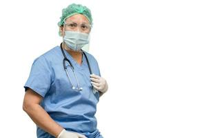 Asian doctor wearing face shield and PPE suit new normal to check patient protect safety infection Covid 19 Coronavirus outbreak isolated on white background with clipping path. photo