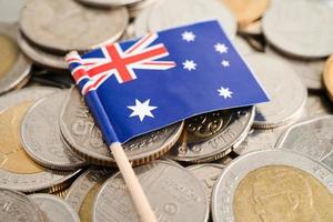 Stack of coins with Australia flag on white background. flag on white background. photo