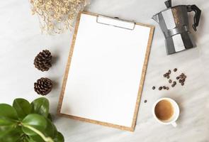 Menu paper mockup with coffee cup in restaurant for input design list text. photo